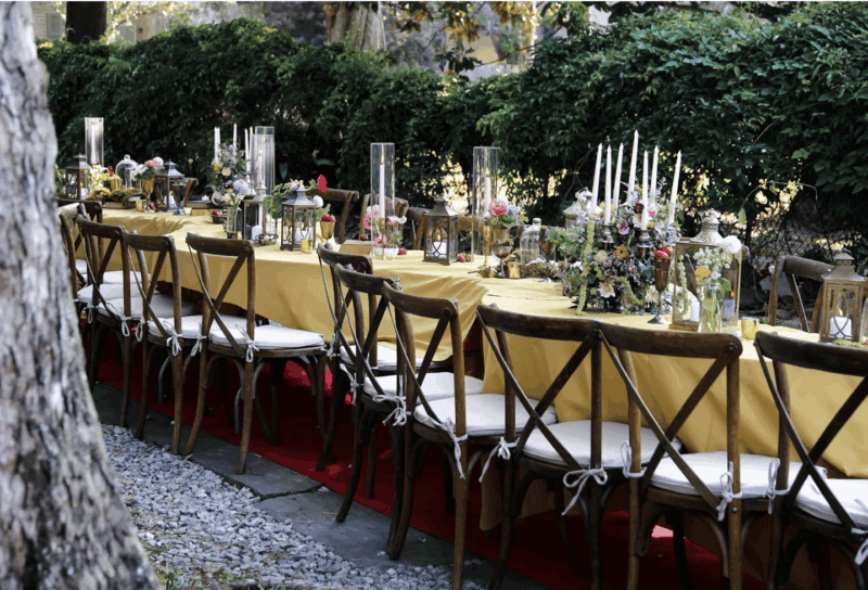 Long table shows outdoor wedding catering at a new orleans wedding