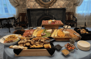 table filled with food shows grazing table ideas